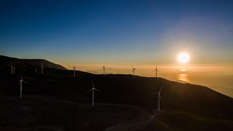 Offshore wind farm at sunset